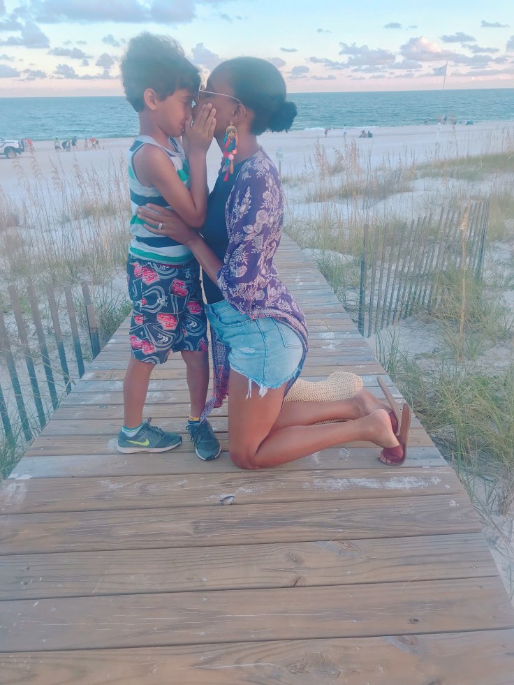 While this photo is not at home, I have recreated this photo at home against an accent wall. #familyphotos #familyphotoideas #familyphotoshoot #kissesphotos #pictureswithkisses